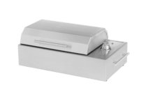Side view of a compact stainless steel electric grill with a closed lid, side handles, and knob controls, isolated on a transparent background for product display.