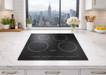 a black 4 burner cooktop in a nyc kitchen